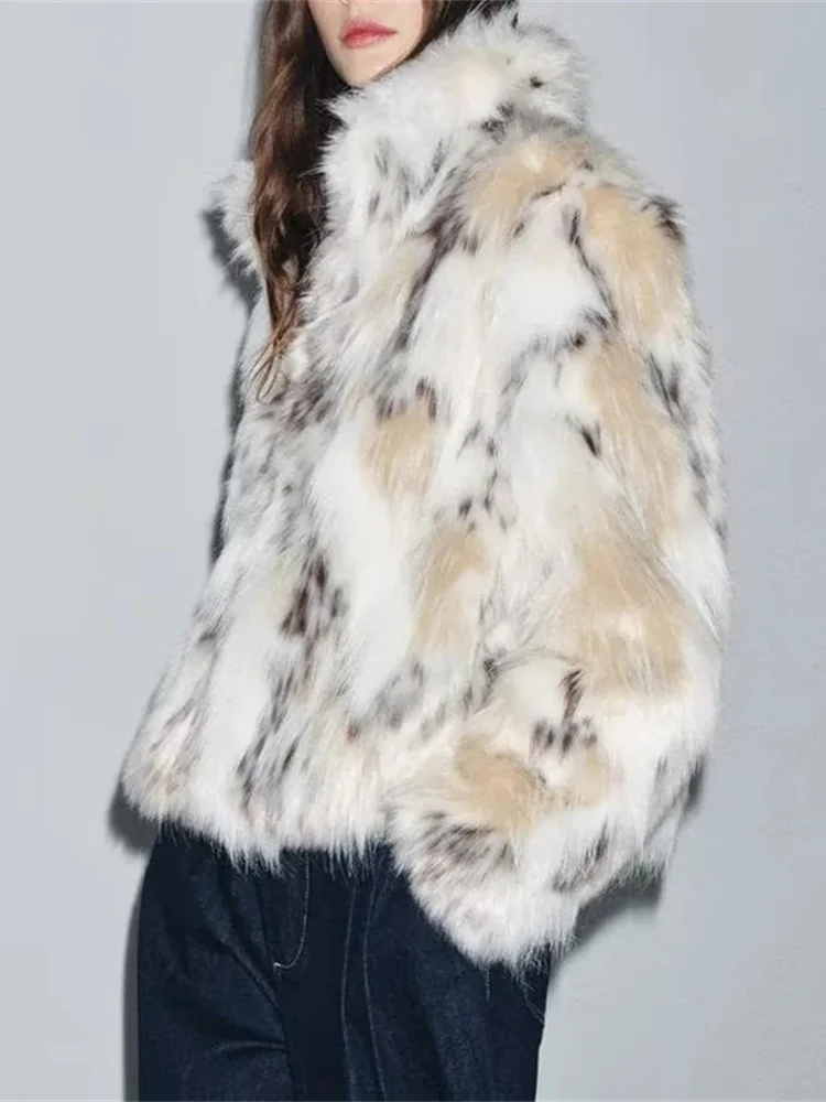 Nuevo Otoño Faion sensación de gama alta abrigo de mujer efecto piel Artificial estampado de leopardo de nieve largo Sve Stand Collar Jaet