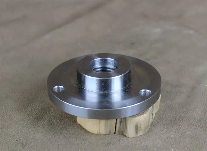 Transfer flange of metalworking lathe chuck for woodworking lathe