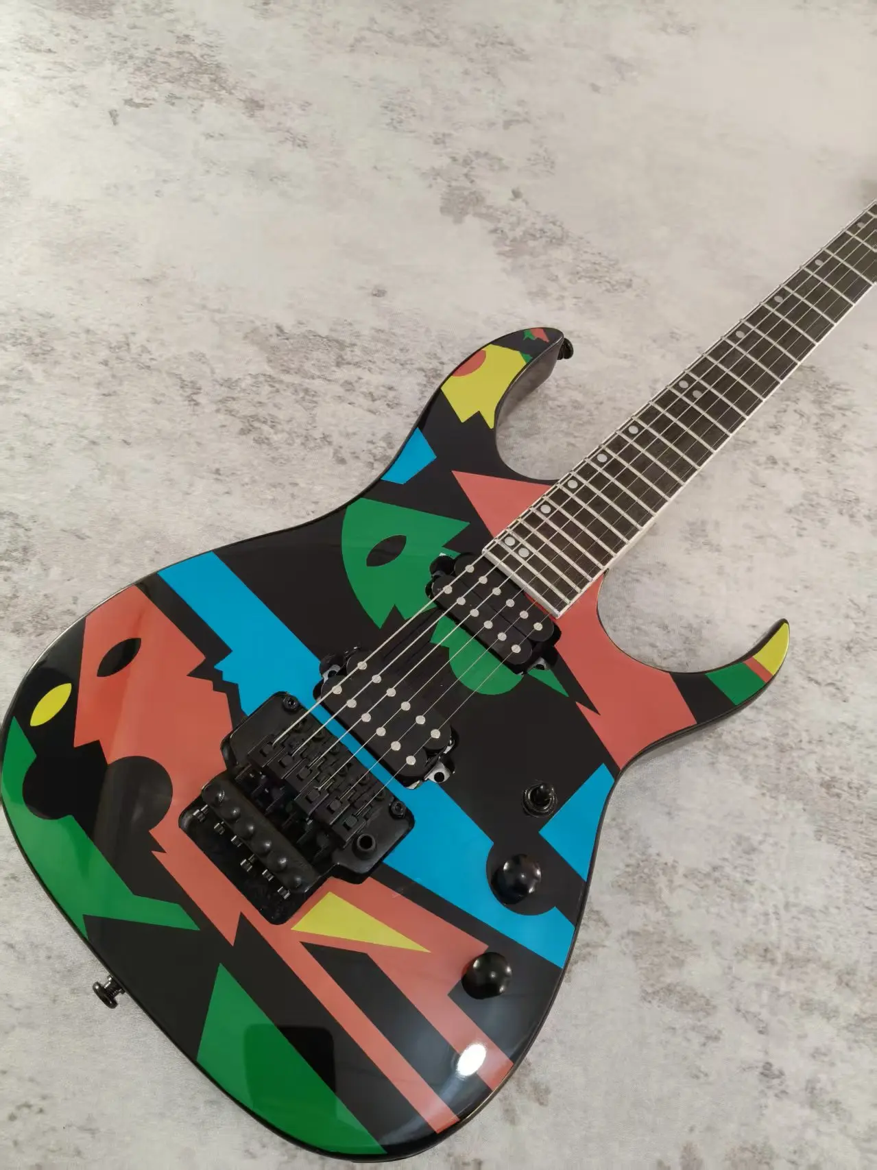 6 String Double Cutaway Solid Body Electric Guitar, Multicolor Geometric Graffiti Surface, HH Pickups Double Tremolo