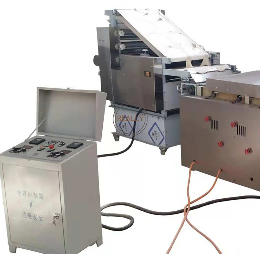 เตาอบแก๊สเชิงพาณิชย์เครื่องทําหนังเค้กอาหรับทรงกลมอุปกรณ์ทําเปลือกสี่เหลี่ยมผืนผ้าปรับแต่งได้