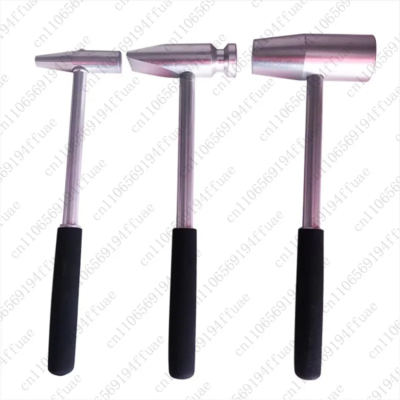 

Rubber hammers are used to remove dents caused by hail damage.