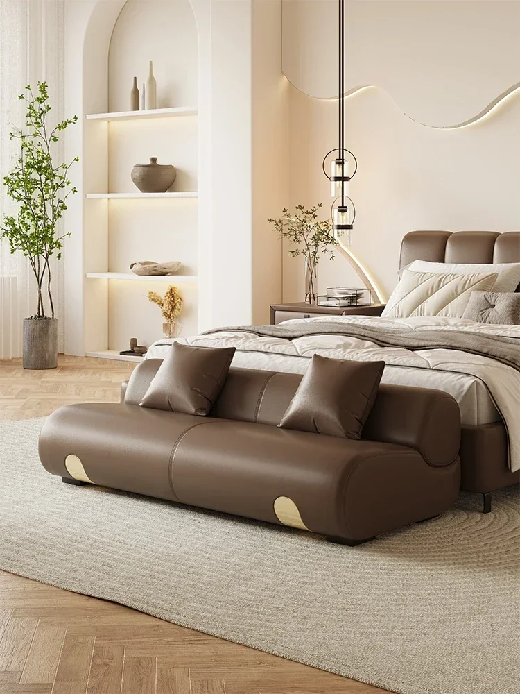 Italian leather sofa stool at the end of bed