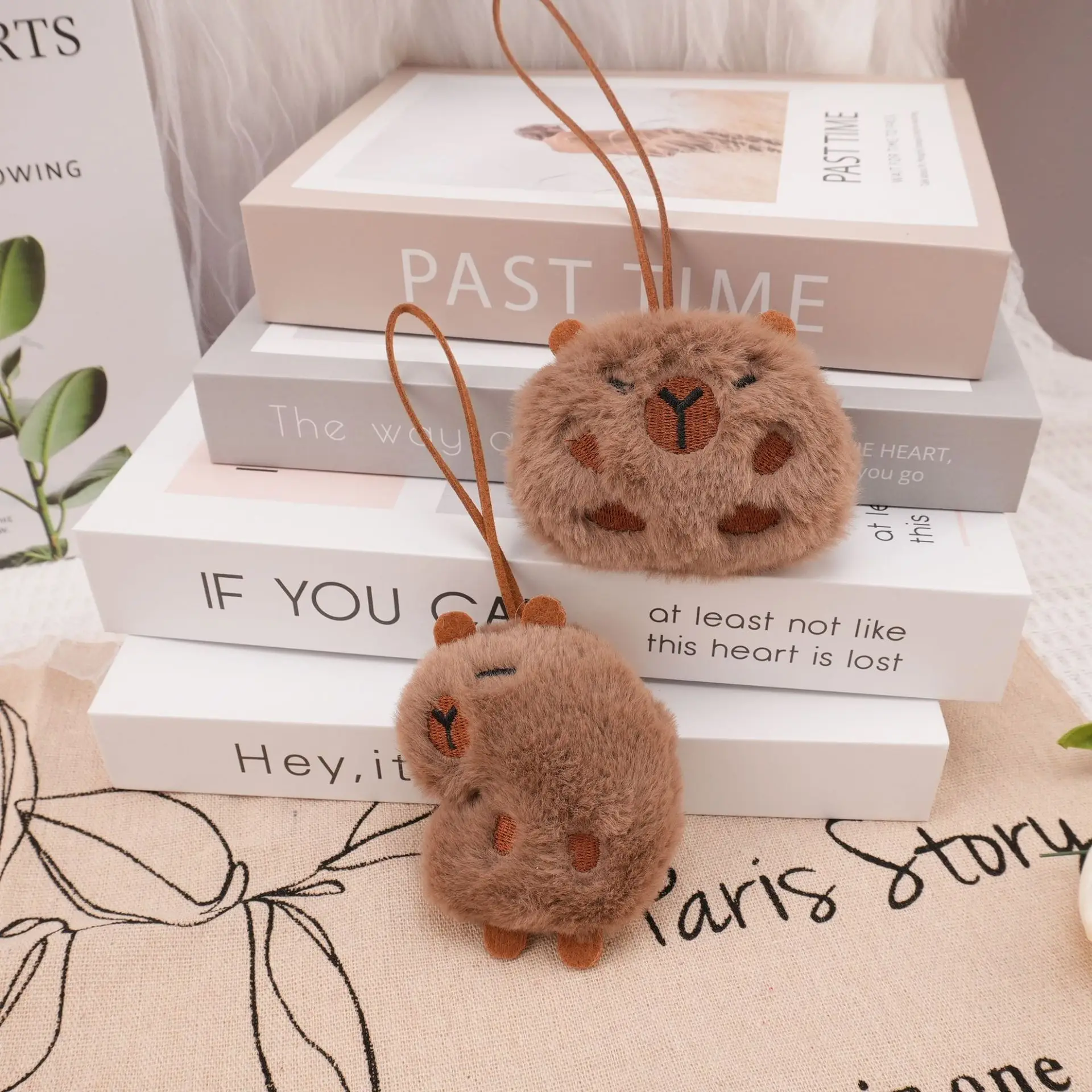 

Kapibala plush pendant, autumn and winter backpack pendant, gift keychain