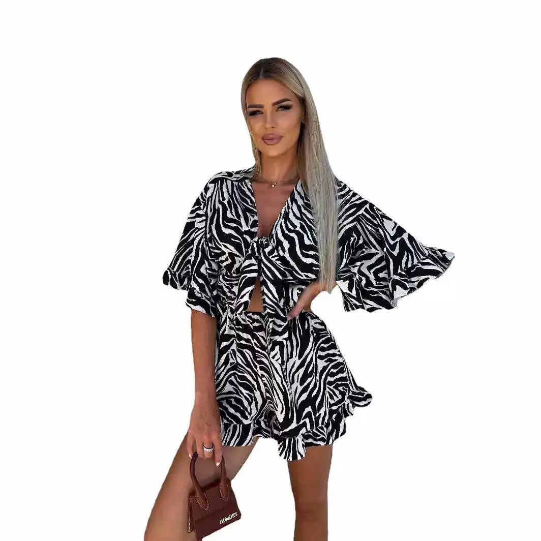 Tuta ort a vita alta con cravatta a V con cintura Svel Stampa leopardata Street Sle Abito intero da donna in tessuto sottile