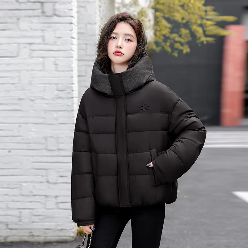 Nouveau modèle manteau rembourré en coton pour femmes routine de style court nouveau Style chinois hiver épaissir grande taille fermeture éclair à capuche Vintage