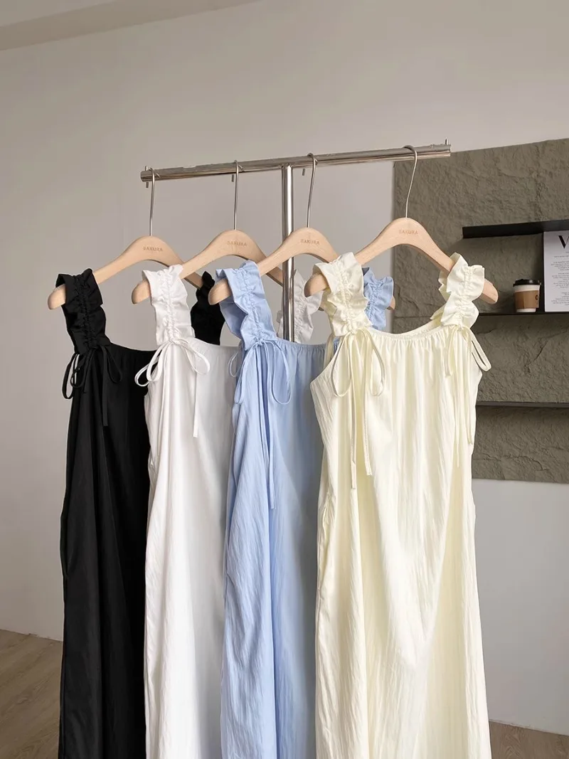 Férias vento gola quadrada fora do ombro vestido com cordão 2025 nova moda verão temperamento feminino coreano macio saia longa