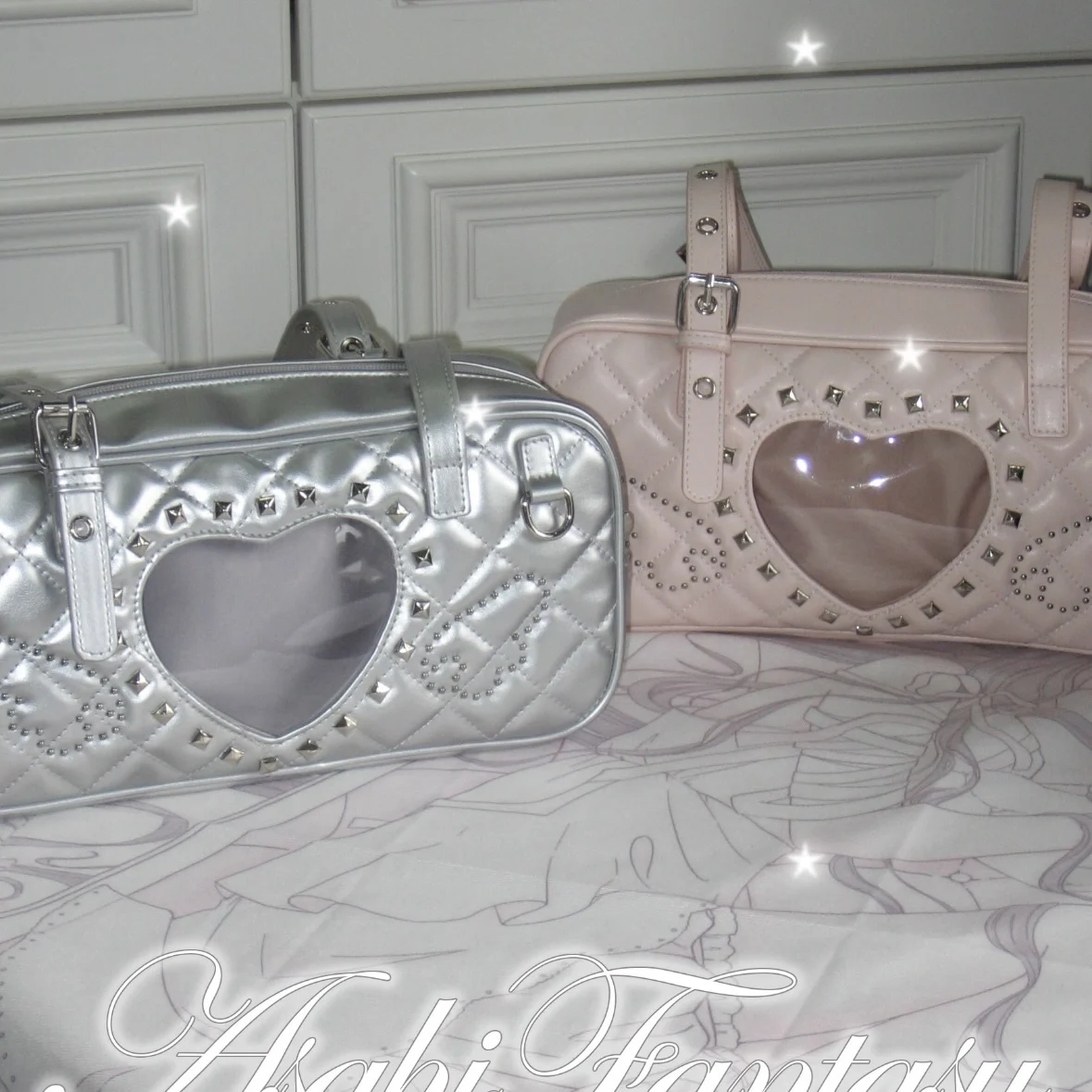 Borsa a tracolla lolita rosa trasparente con borchie e tasche_voghion.com