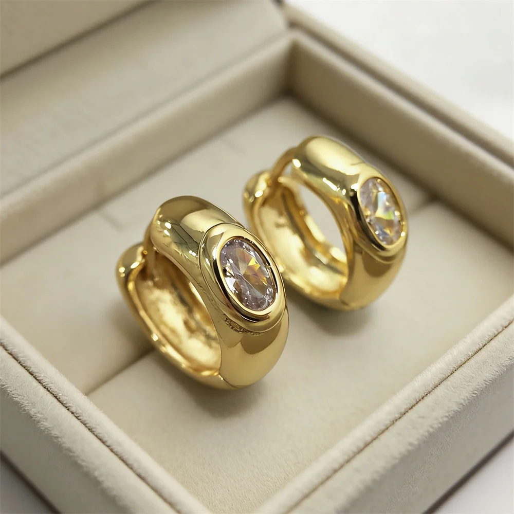 18K Gold Plated Copper Huggie Earrings with Oval Cubic Zirconia Chunky Polished Hoop Design Minimalist Luxury Jewelry for Women