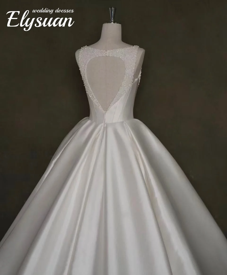 Vestidos de casamento de gola quadrada personalizados uma linha applique vestido de noiva de renda com bolsos sem costas sem mangas