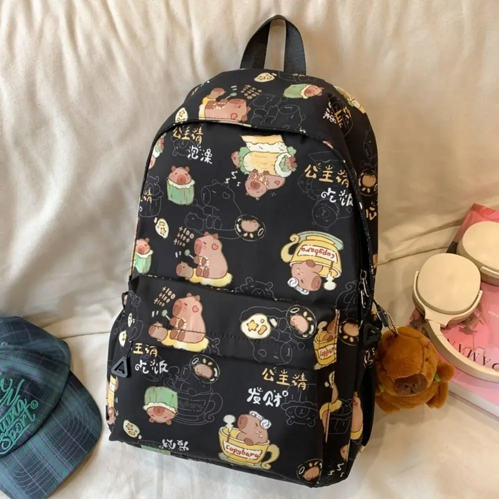 Mochila Capybara de gran capacidad para niños, bolso de hombro de dibujos animados de animales de estilo coreano con colgante, bolso escolar