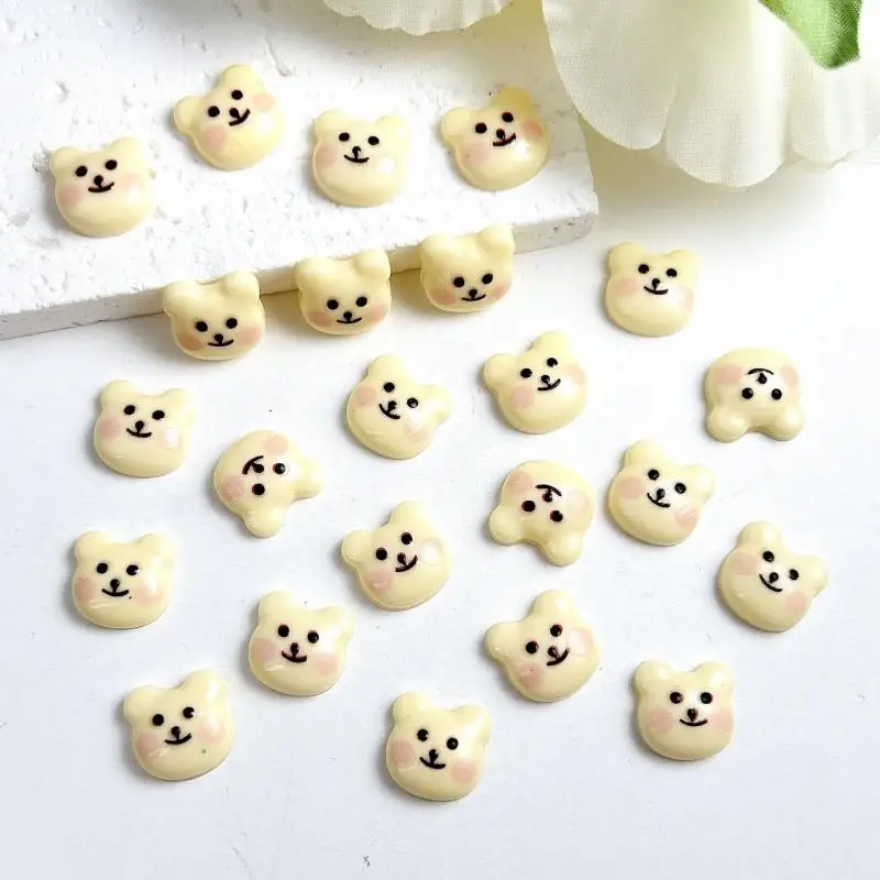 Entzückende gelbe Smiley-Gesicht Bär Nail Art Dekorationen Cartoon leuchtende Puder Rouge Bärenkopf Harz Nagel Charms für DIY Nägel