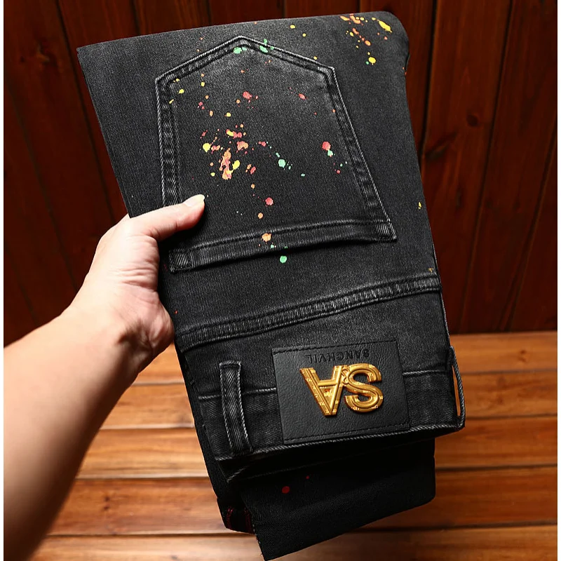 High end trendy black jeans for men, slim fit, elastic, perforated patch, paint printed, trendy street style small leg pants