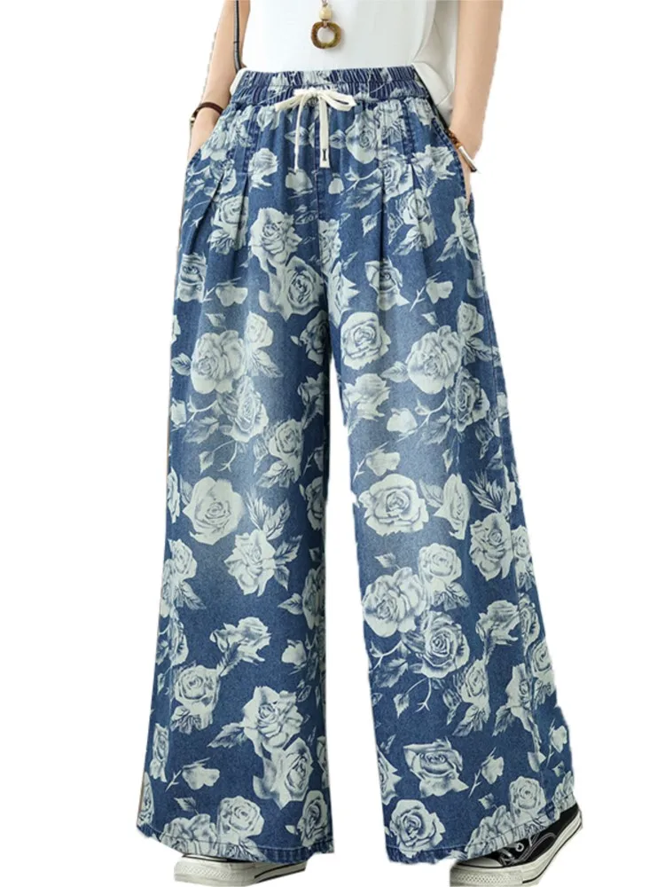 特大ジーンズ弾性ハイウエスト夏のパンツ女性の花花柄 Modis 女性のズボンカジュアルルーズワイドレッグ女性パンツ