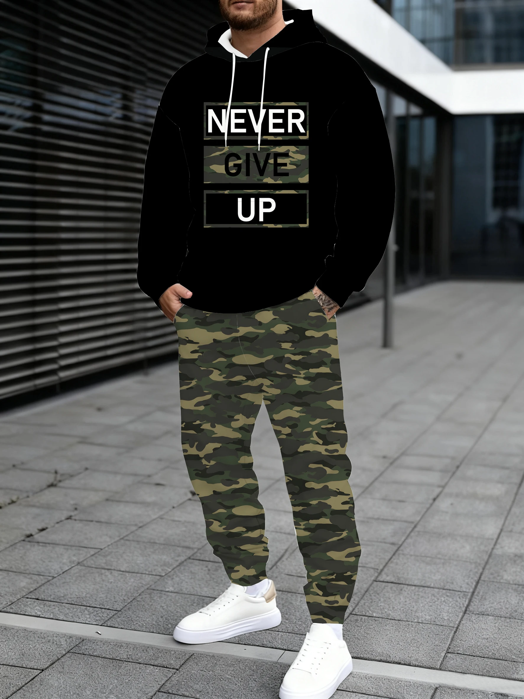 

Men's hooded sweatshirt paired with sweatpants printed with the letters "NEVER GIVE UP" and camouflage prints, a versatile stree