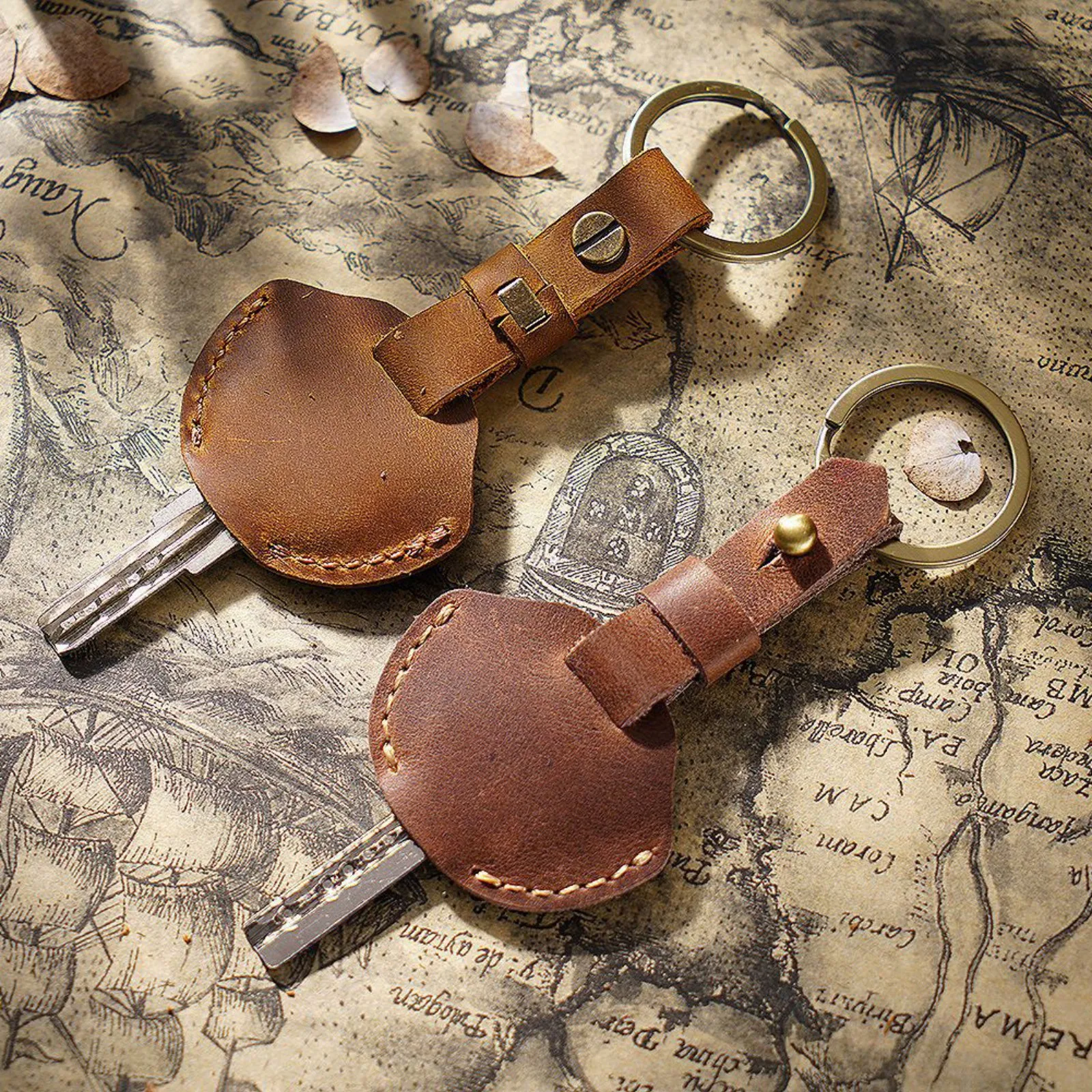 غطاء غطاء مفتاح من الجلد الطبيعي مع حلقة سلسلة مفاتيح، حافظة مفاتيح جلدية أنيقة على شكل سلسلة مفاتيح للسيارة للنساء والرجال