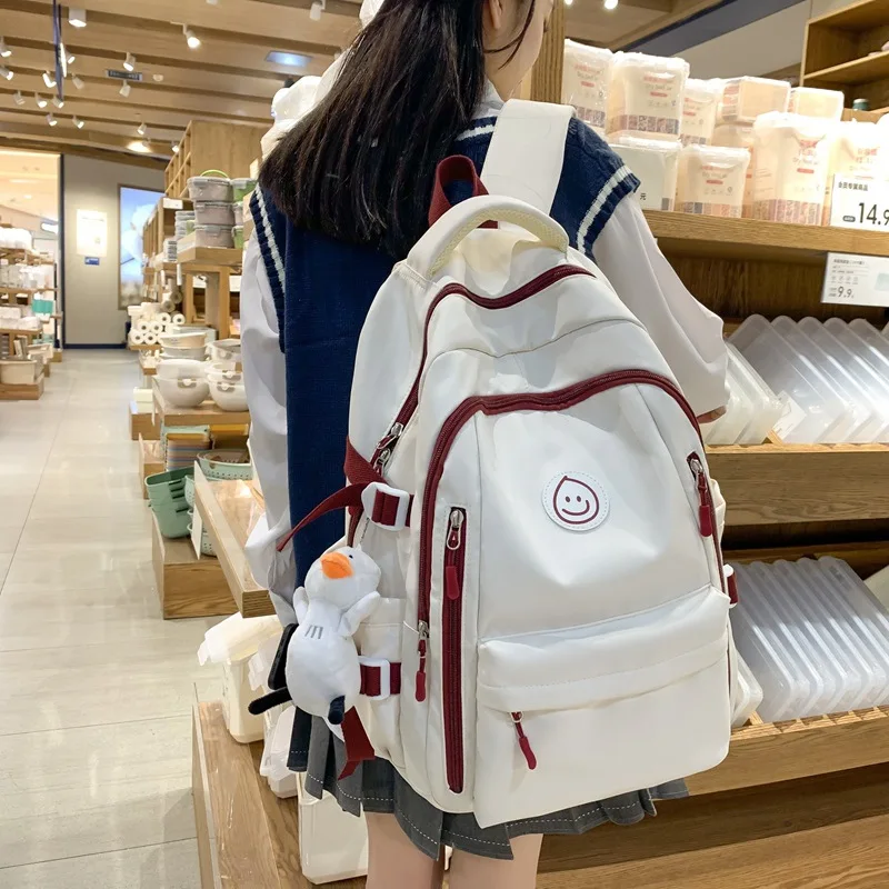 

Women Cute Contrast Color Backpack White Casual School Bag With Smiley Patch & Duck Pendant For Students Daily Use