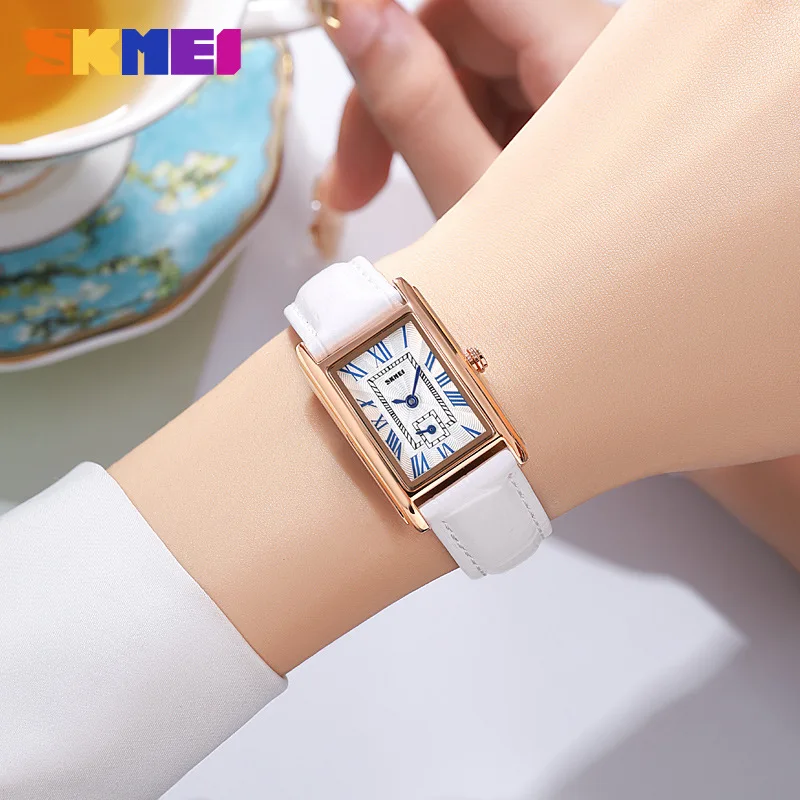 ساعة SkmeiSimple بمقياس روماني للنساء بحزام كوارتز مربعة الشكل، ساعة عصرية بمزاج للنساء