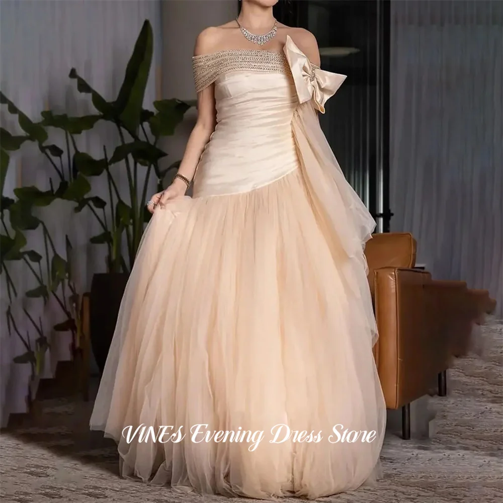 

VINES Champagne A Line Tulle Prom Dresses Off Shoulder Formal Dresses with Beaded and Bow Party Dresses for Women Customized