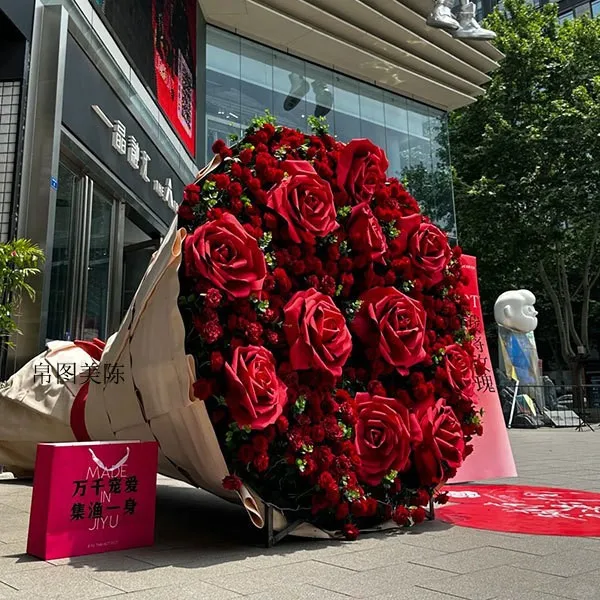 Large and giant red rose paper art flower beauty display event layout
