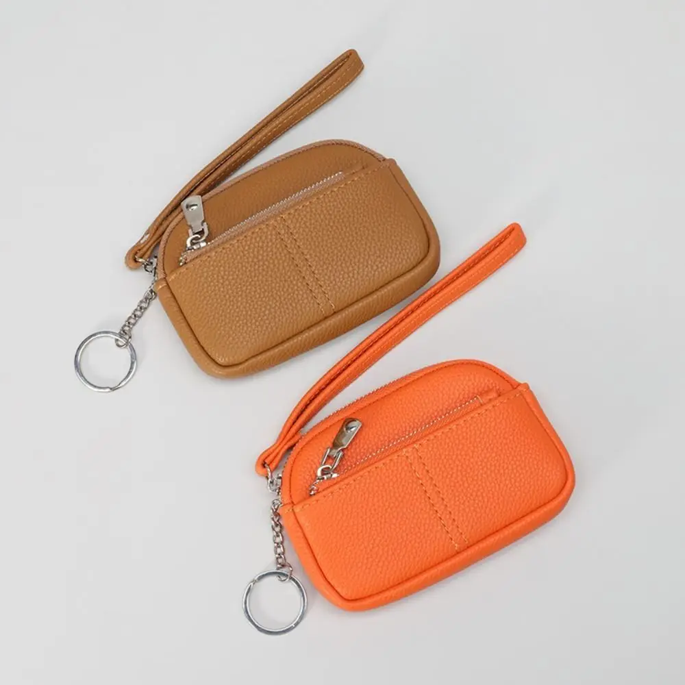 ファッション Pu レザー女性ミニ財布無地ジッパー学生小銭入れ収納袋大容量リストキーバッグ