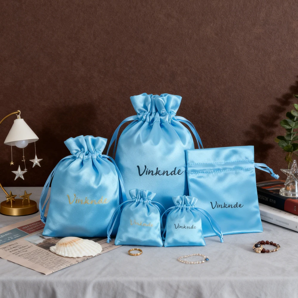 

50Pcs/Lot Jewelry Travel Organizer Gift Bags Custom Logo Silk Satin Drawstring Packaging Pouch Wedding Favors For Rings Necklace