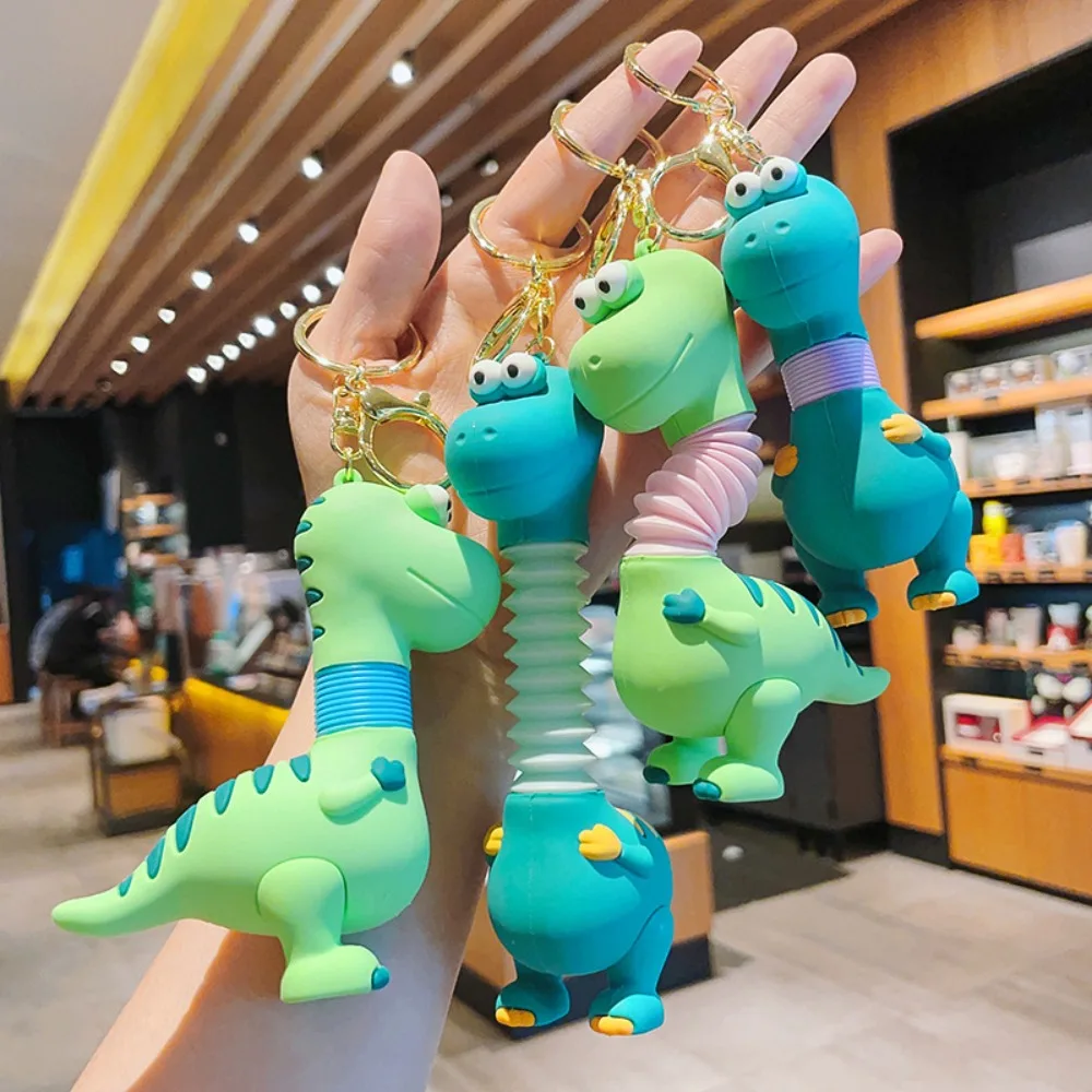 Cartoon Green Dinosaur Keychain Retractable Spring Neck Anime Figure Dinosaur Dolls Pendant Creative Kids Gift Bag Charms