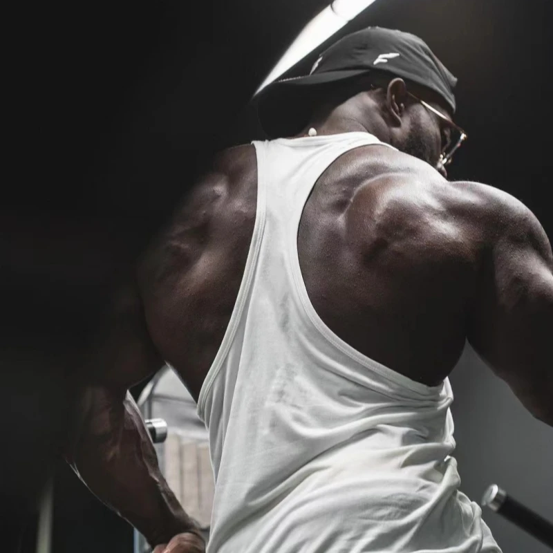 Canotta da uomo con cinturino sottile con retro scollato, tessuto traspirante, ideale per bodybuilding e allenamenti in palestra intensi quotidiani