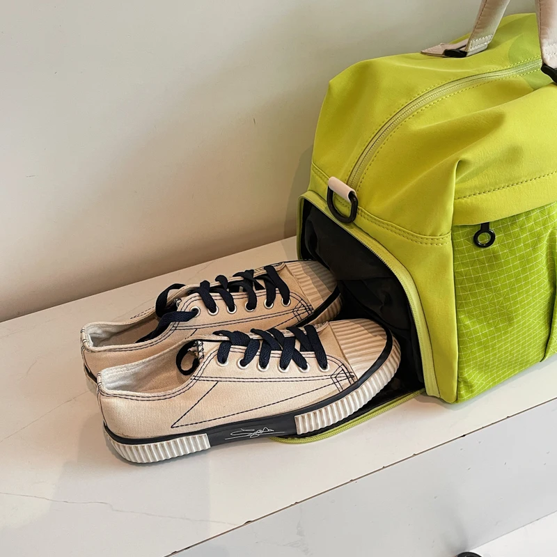 Stoffen tas met grote capaciteit Designer reiskleding Bagage Handtas Schoenencompartiment Reizen Handbediende waterdichte nieuwe crossbodytas