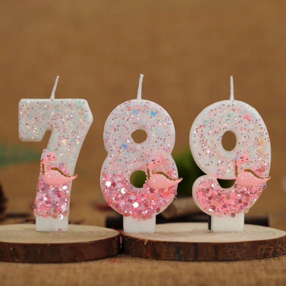 Powdered White Sequin Number 0 Candle. Cartoon Pink Little Dinosaur Candle, Holiday and Commemorative Occasion Candle.