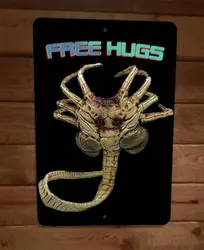 Metalowy znak ścienny Free Hugs Alien Face Hugger 8x12