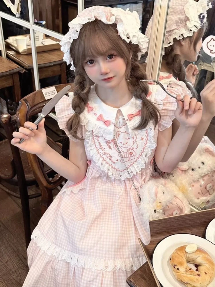 women's pastel pink kawaii dress Dreamy Ruffles Lolita ON723  KawaiiMoriStore and the included accessories enhance the overall look. Pink Kawaii Dress