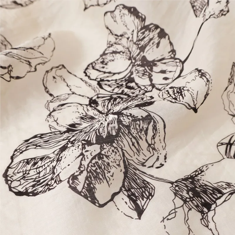 Thin slightly translucent beige base ink-style printed cotton and linen blended fabric for shirts skirts trousers 3