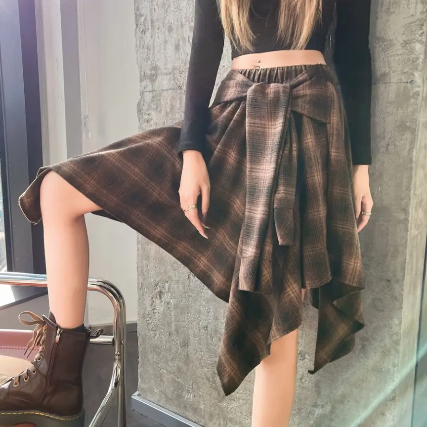 

Qiukichonson Bandage Mini Skirts Women Woolen Skirt 2025 Goth Autumn Winter High Waist Ruffles Asymmetrical Plaid Skirt Maxi