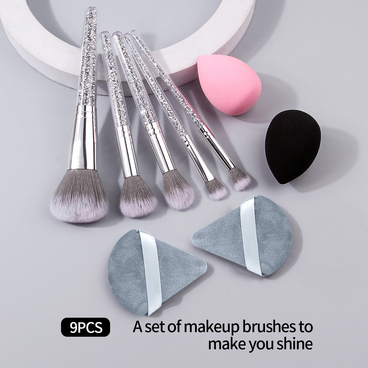 9-częściowy profesjonalny zestaw pędzli do makijażu: zestaw pędzli do makijażu z diamentowymi uchwytami + gąbka do makijażu w kształcie jajka, nieprzywierająca do pudru.