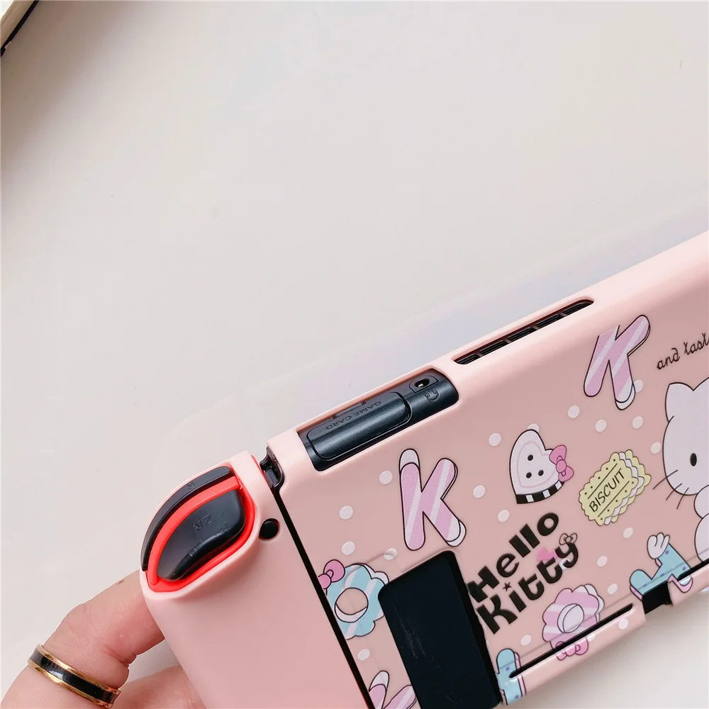 MINISO Hello Kitty para interruptor, carcasa protectora dividida, accesorios para Nintendo Switch, consola NS, Fundas de TPU