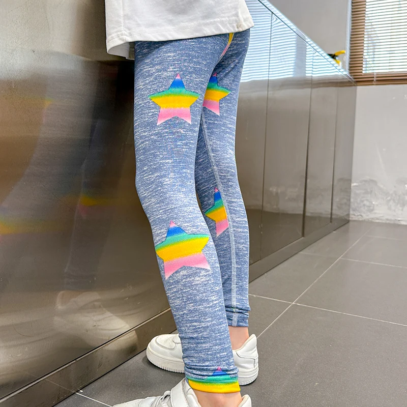 Girls four seasons thin leggings are comfortable, slim and cute. Printed pants for female students are simple and solid colors.