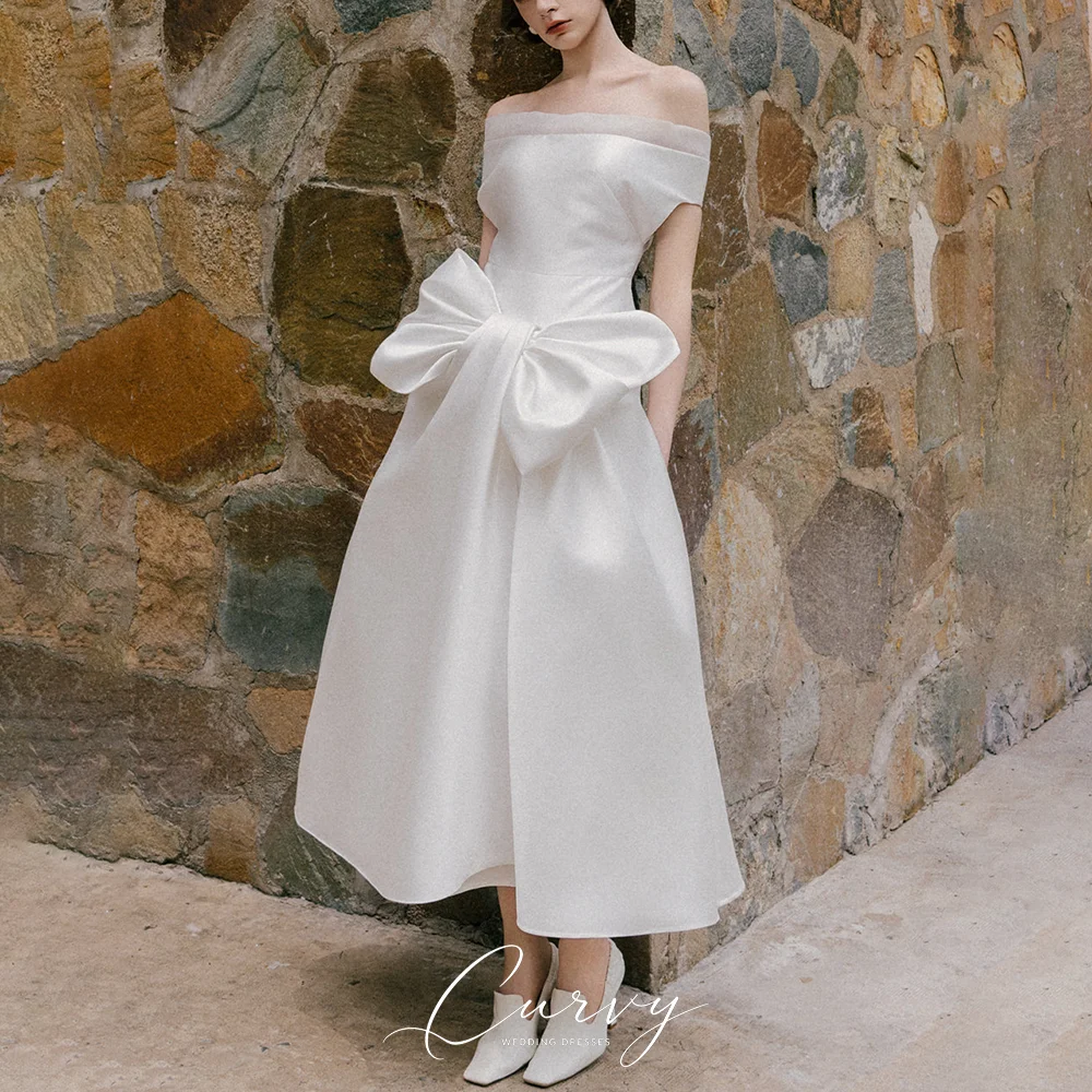 

Curvy Minimalist Retro웨딩드레스 Wedding Dress for Women Off-Shoulder Satin Bow Midi Bridal Dress Customized 2026