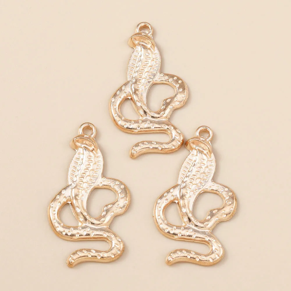 Leslie 10 Stück 18 x 34 mm goldfarbene Cobra-Schlangen-Anhänger für DIY handgefertigte Halsketten, Armbänder, Schmuckherstellung – Detail 4