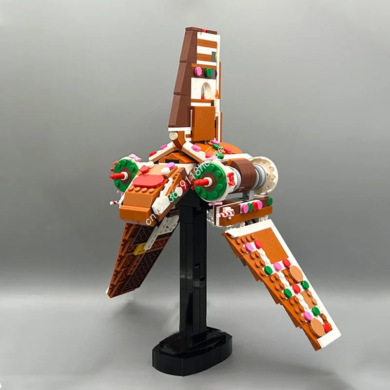 

Новинка, 717 шт., пряничный челнок (с подставкой), модель Starfighter, строительные блоки, обучающие игрушки «сделай сам», сборка для детей, рождественские подарки