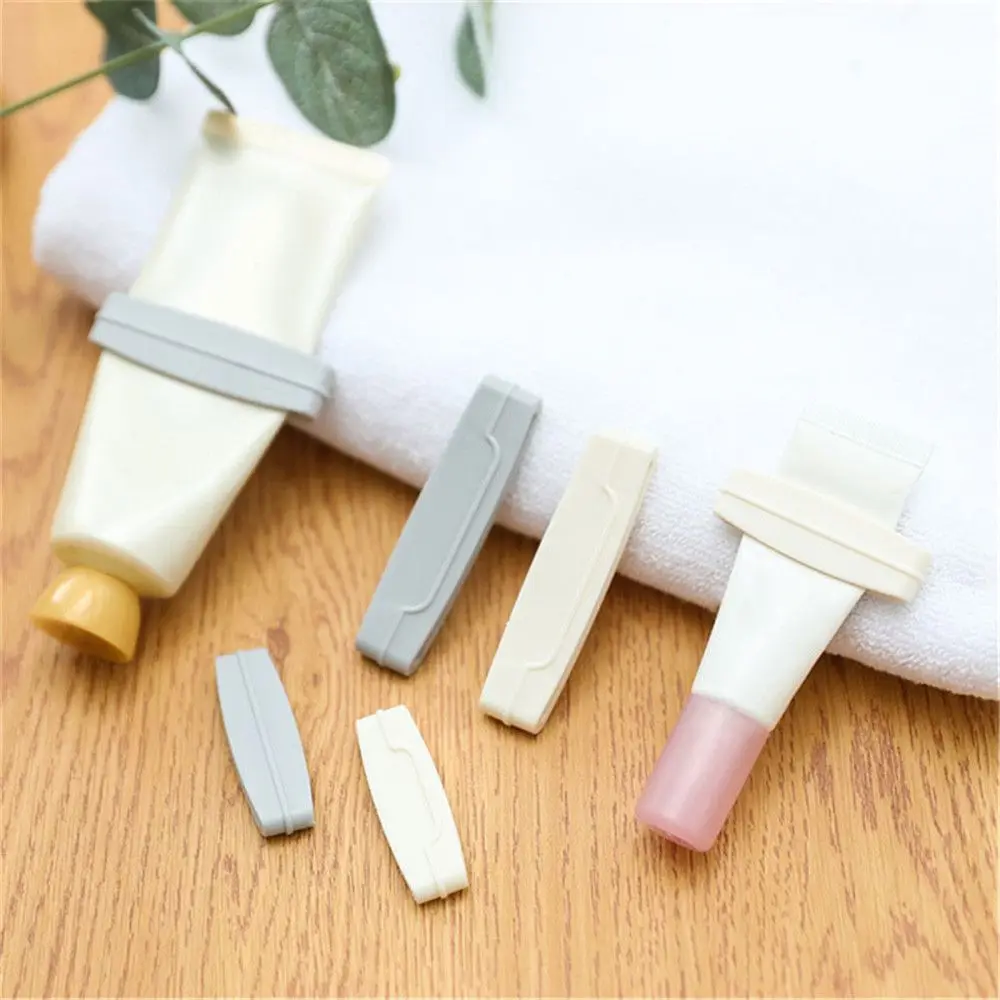 3PCS/Set Bathroom Supply Holder Stand Plastic Cosmetics Cleanser Extruder Toothbrush Holder Toothpaste Squeezer Rolling Tube