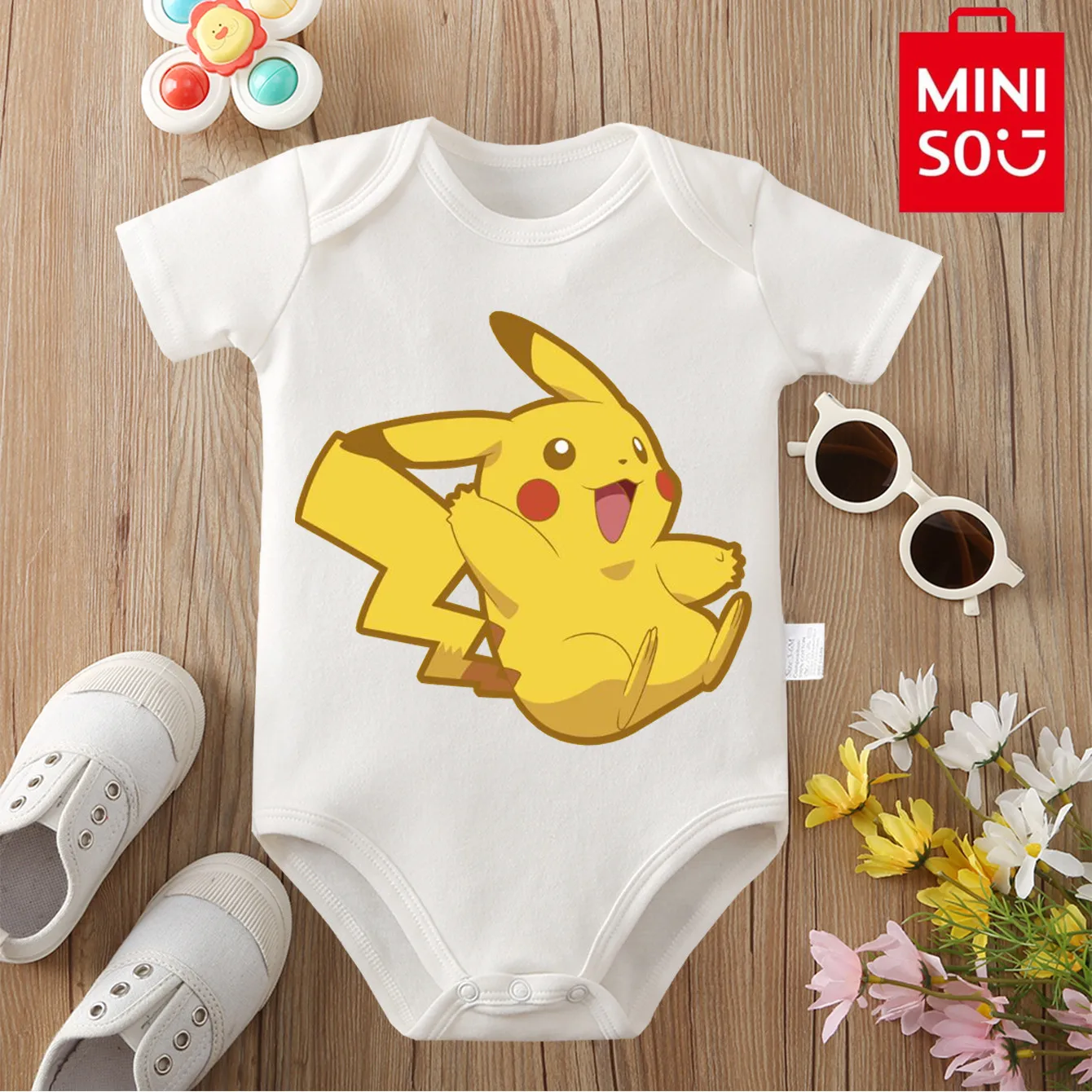بدلة قفز مريحة من القطن بنسبة 100% من MINISO AshKetchum Pikachu للأطفال حديثي الولادة من عمر 0 إلى 12 شهرًا
