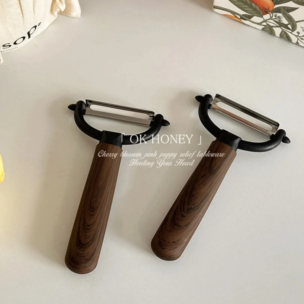 

Wooden handle stainless steel home multi-functional planer fruit and vegetable peeler tool Potato scraper household