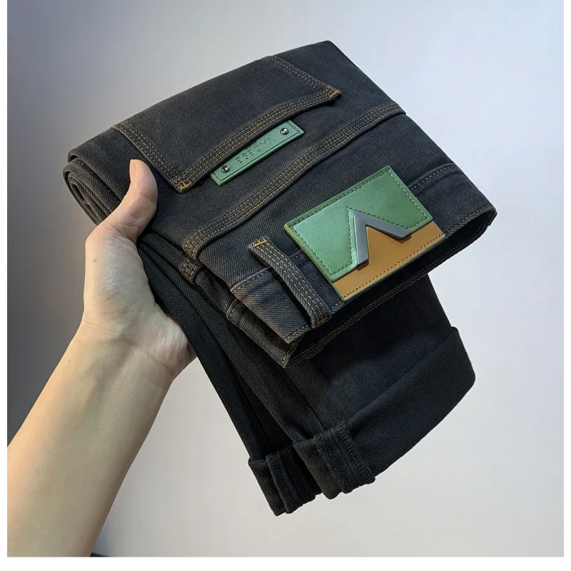 

Light luxury high-end fashionable jeans for men in autumn 2025, thick and trendy casual slim fit elastic denim small leg pants