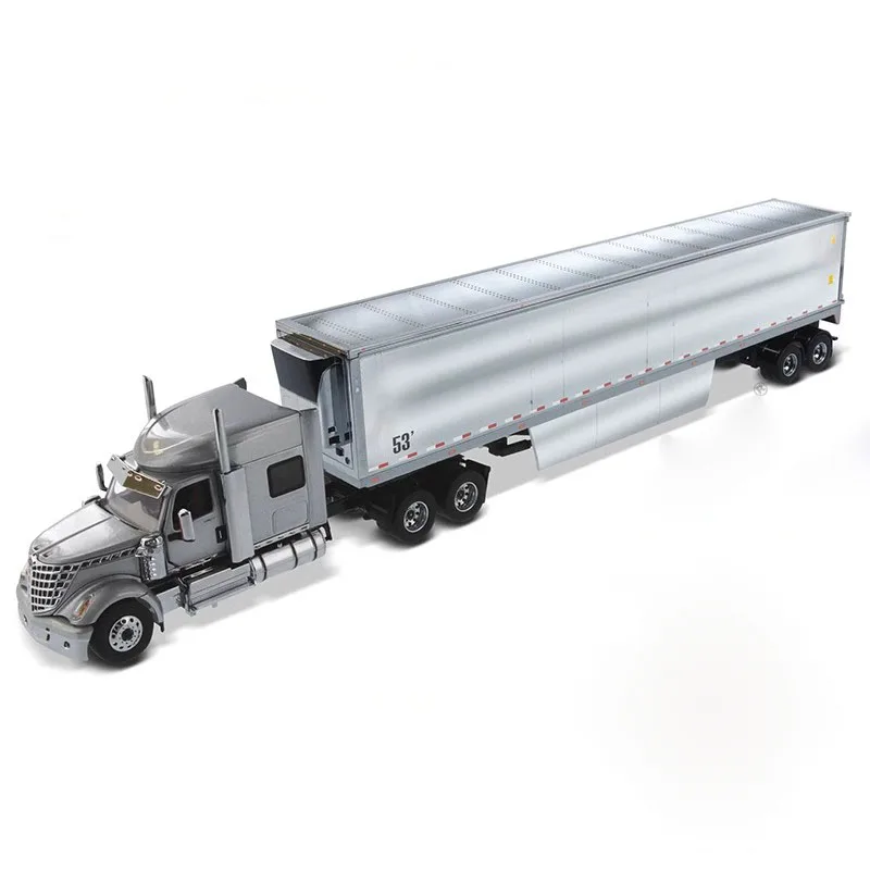 1:50 International HX520 Tandem Day Cab Tractor with XL 120 Lowboy Trailer in White DM71043