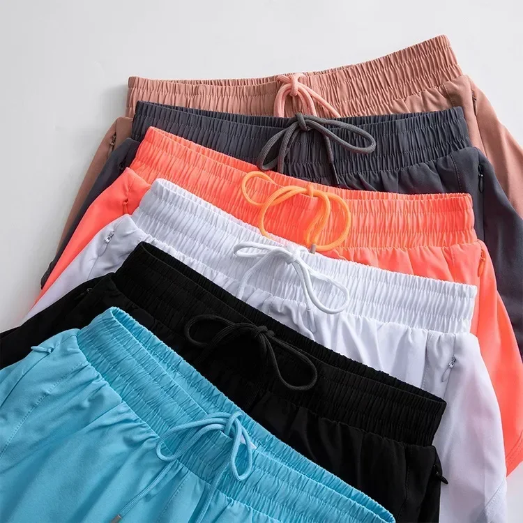 Shorts de malha de limão feminino, tendência esportiva feminina, cintura alta, corrida na academia, duas calças falsas, roupas de treinamento, 2022