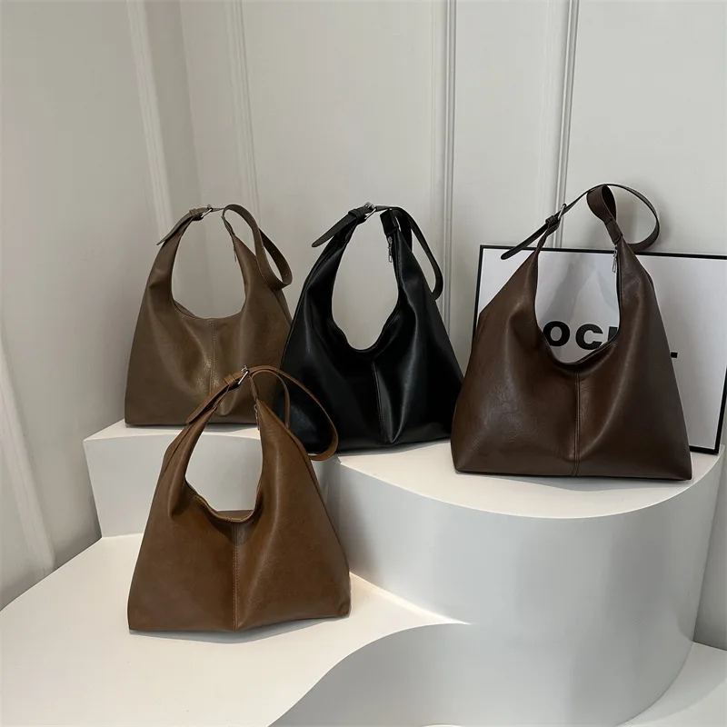 Borsa a tracolla per pendolarismo quotidiano di grande capacità da donna alla moda in materiale PU, borsa a mano semplice e Casual