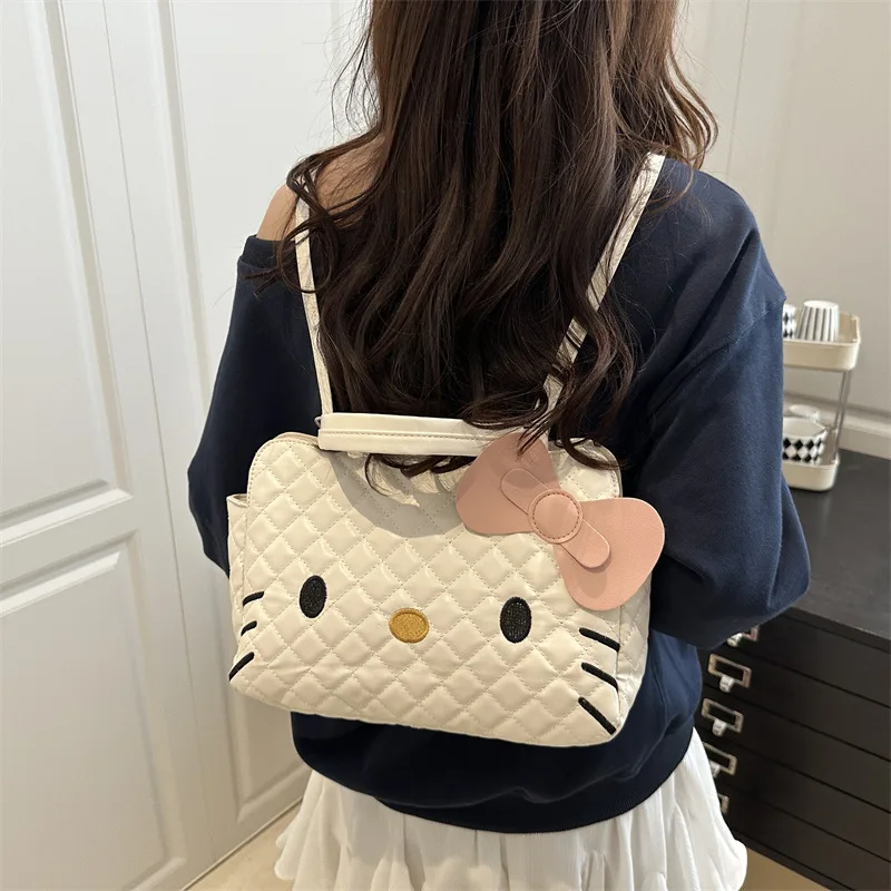 

Cute hello kitty backpack women's new fashion cartoon tote bag large capacity diamond shoulder bag Sanrio