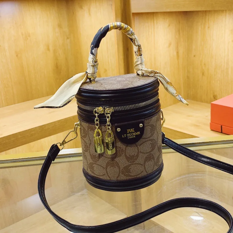 Popular retro rice barrel women all kinds of senior sense FVK barrel bag carrying shoulder messenger bag classic style