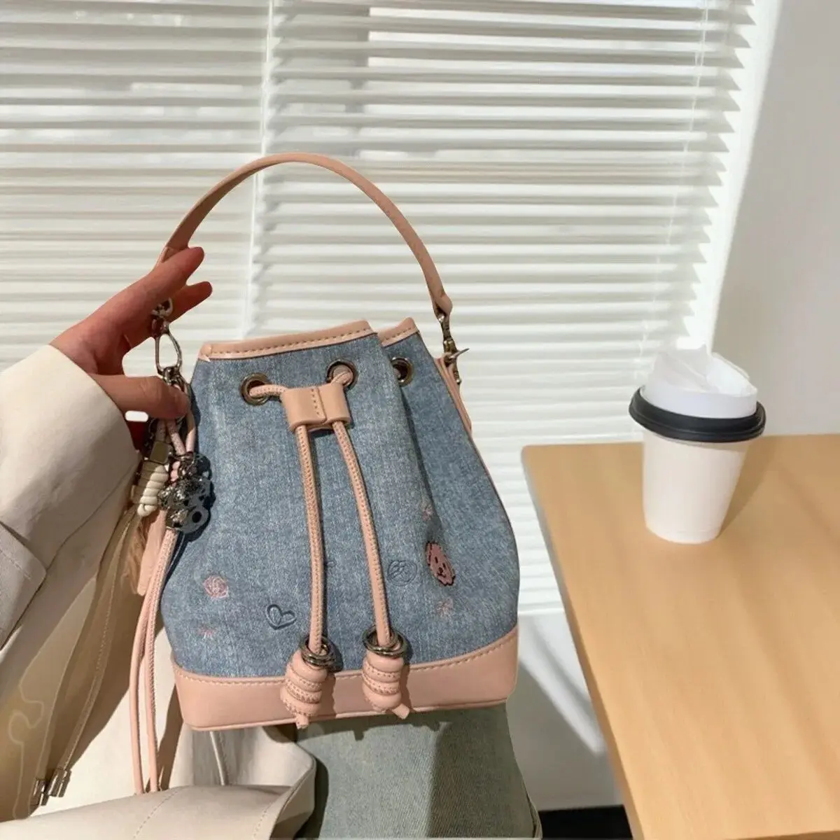 Light Blue Denim Mini Drawstring Bucket Bag, Pink Faux Leather Trim Heart & Floral Embroidery Top Handle Cute Doll Pendant Decor Two-Way Carry Crossbody Purse.