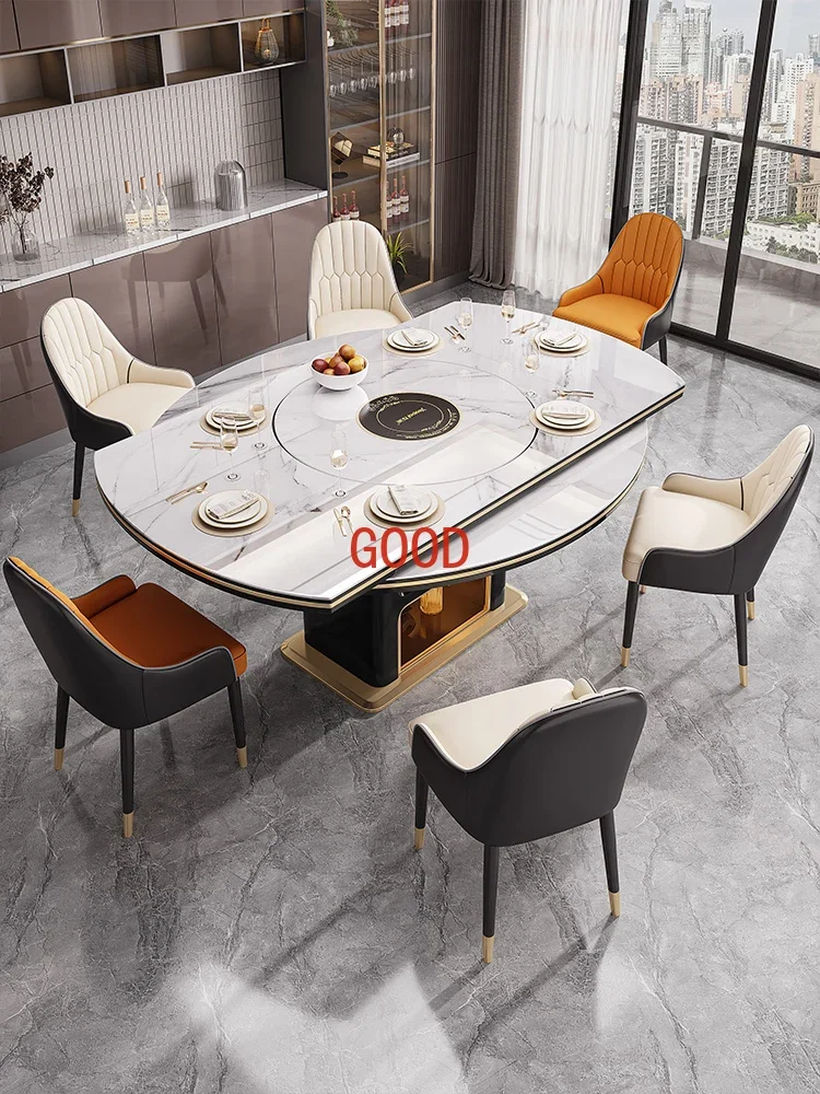 Легкий роскошный круглый обеденный стол из каменной плиты. Небольшая квартира со встроенной телескопической индукционной плитой с поворотным столом.